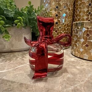Nina Ricci dancing ribbon perfume. 1.7 oz. 50ml. Discontinued and hard to find!
